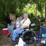 Mormon woman enjoying time with extended family LDS woman and extended family