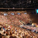 BYU Women's Conference General Session Mormon women sing in Marriott Center at BYU Women's Conference