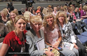 Mormon women pose for a photo between BYU Women's Conference sessions