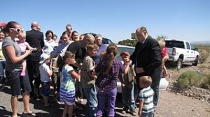 LDS prophet Thomas S. Monson shaking children's hands