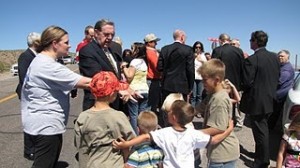 LDS apostle with children